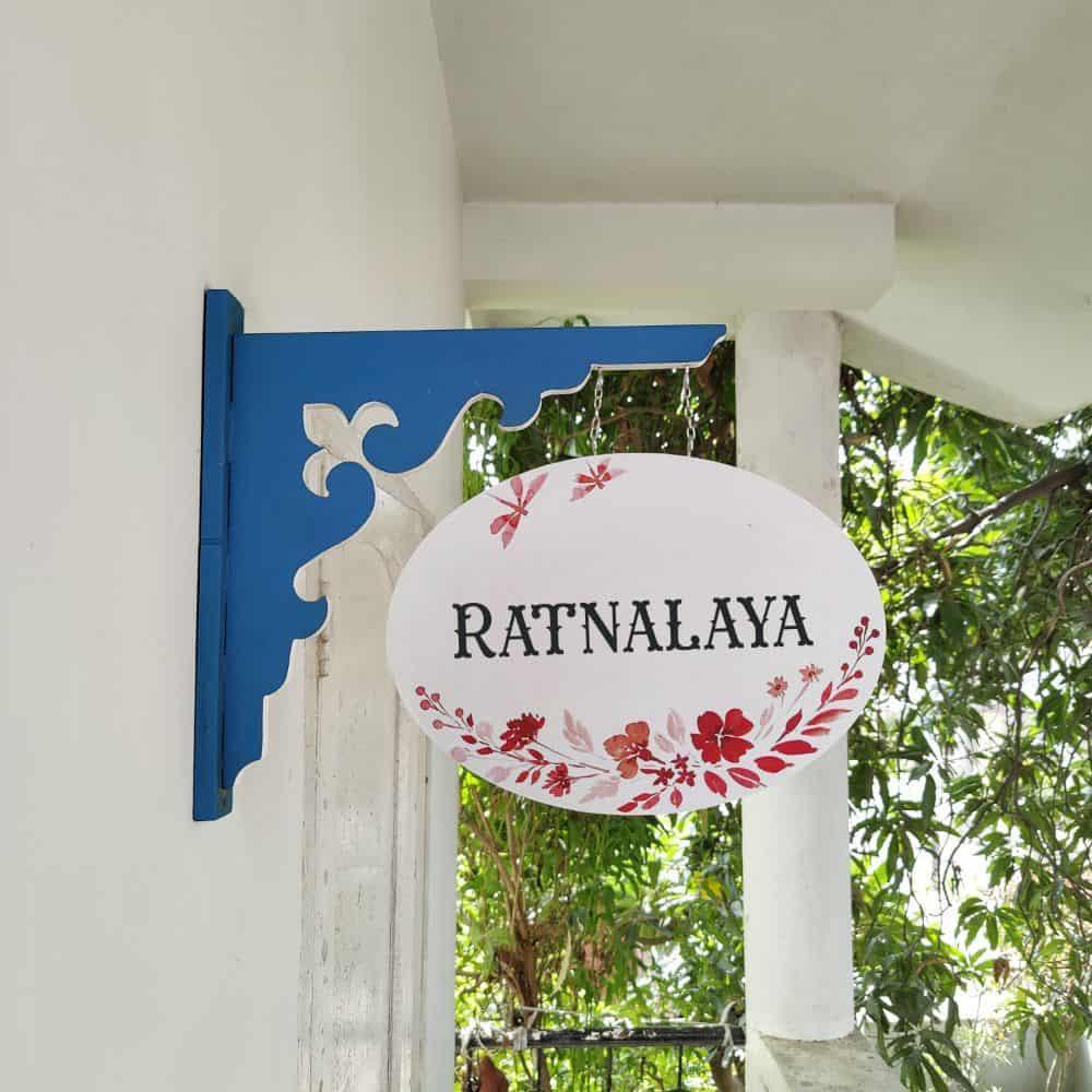 Hand-painted Hanging Name Plate - Navy Oval White Red Flowers